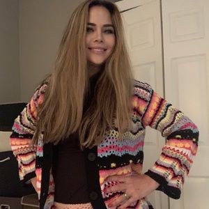 NIB This is a new in bag hand crocheted sweater with flared sleeves I’ve 2 Small